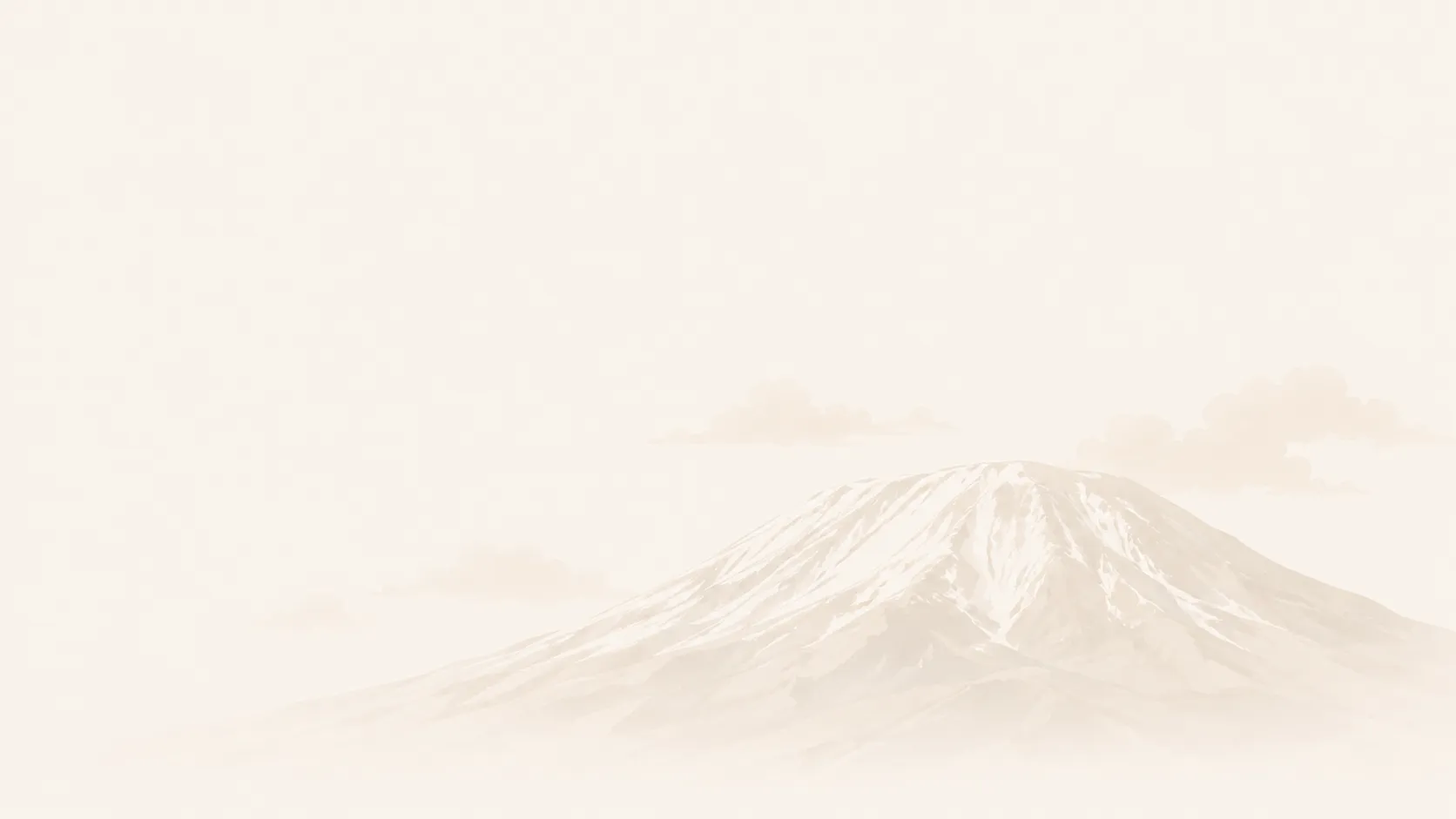Mount Kilimanjaro's snow-capped summit above the clouds
